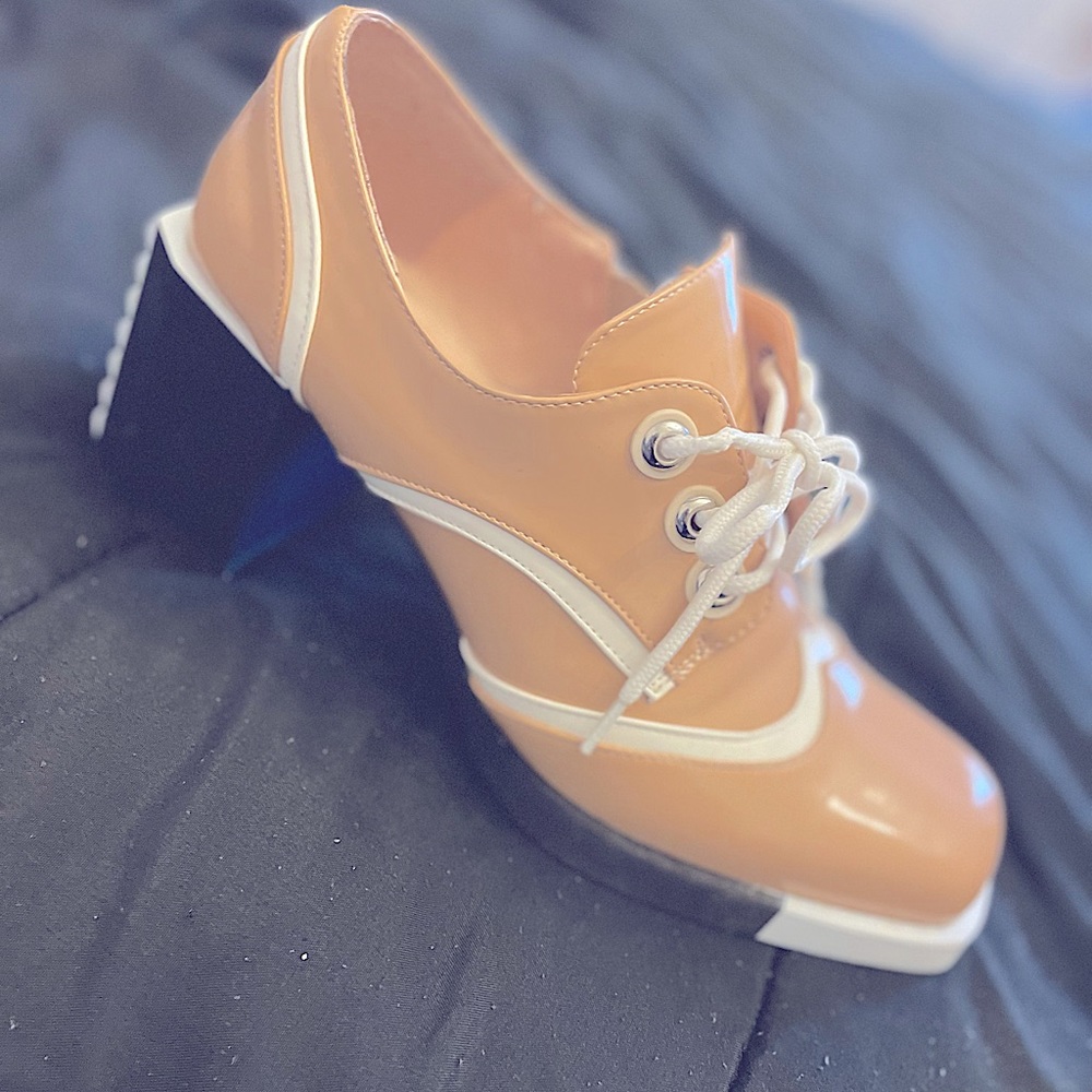 Shoes 8 1/2  tan, black, and white; runs small
